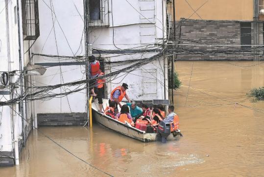Rescue teams have hands full as floods besiege east, south