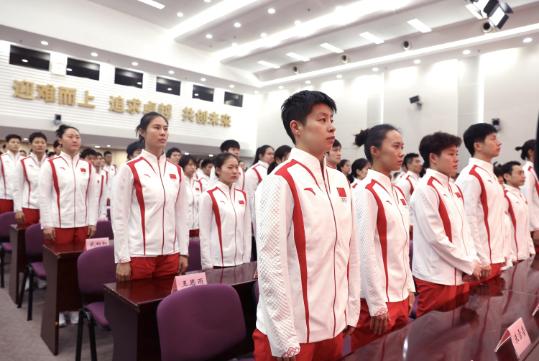 Chinese delegation called on to compete with 'pride and integrity'