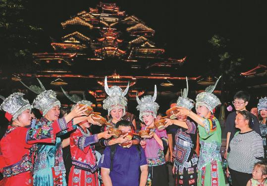 Nighttime carnival celebrates Miao culture