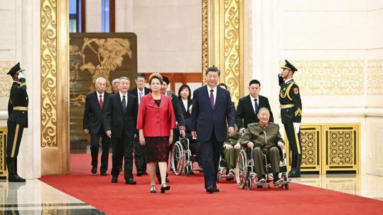 Xi: Forge ahead to build strong nation