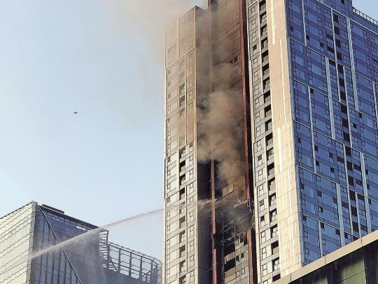 High-rise building fire claims one life in Guangdong