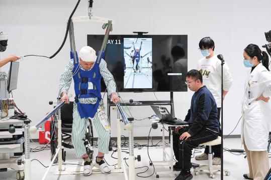 Novel surgery helps paralyzed patients get back on their feet