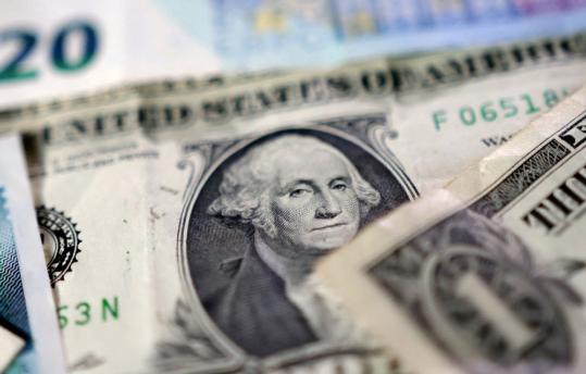 Experts: U.S. policies risk dollar status, global financial order