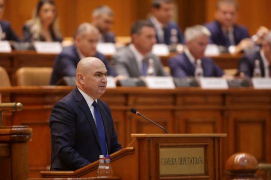 Romanian government survives challenge
