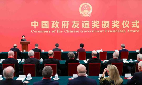 Fifty expats awarded for contributions