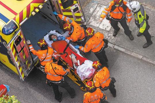 HK unveils sweeping steps after huge blaze