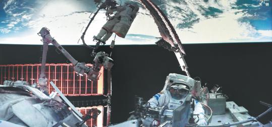 Shenzhou XXI astronauts conduct first spacewalk, install debris shields