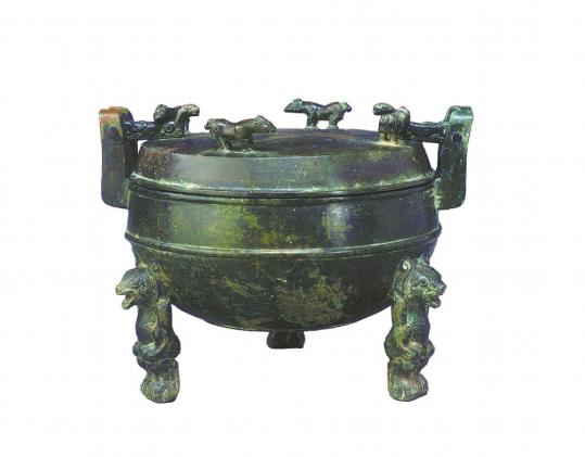 Ancient pressure cooker making a stir