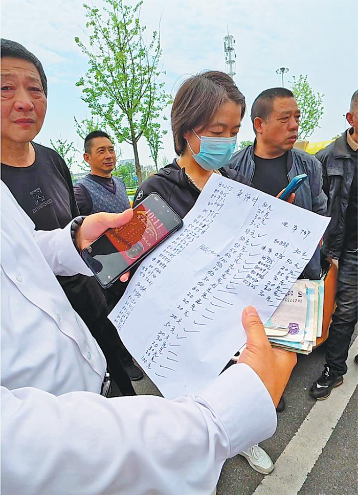 Another screenshot from the video shows the list of donations made by taxi drivers with their license plate numbers and donation amounts.(Photo: Wen Qin/ China Daily)