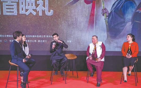 Director Bilal Lashari shares behind-the-scenes stories during the blockbuster's China premiere held in Beijing on May 19. (Photo provided to China Daily)