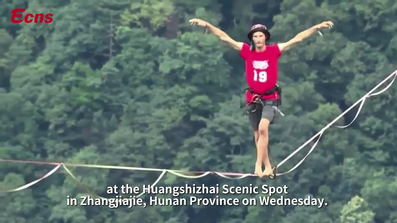 Luxembourg's Archie Williams wins 'King of Asia' slackline championship in Central China