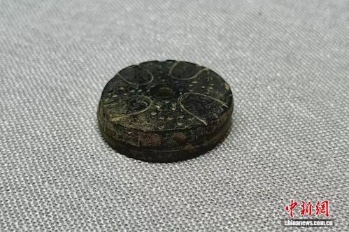 4,300-year-old lotus-patterned spindle whorl discovered in Henan