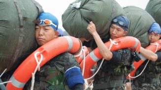 踏浪淬火！直击武警武装泅渡教练员集训现场